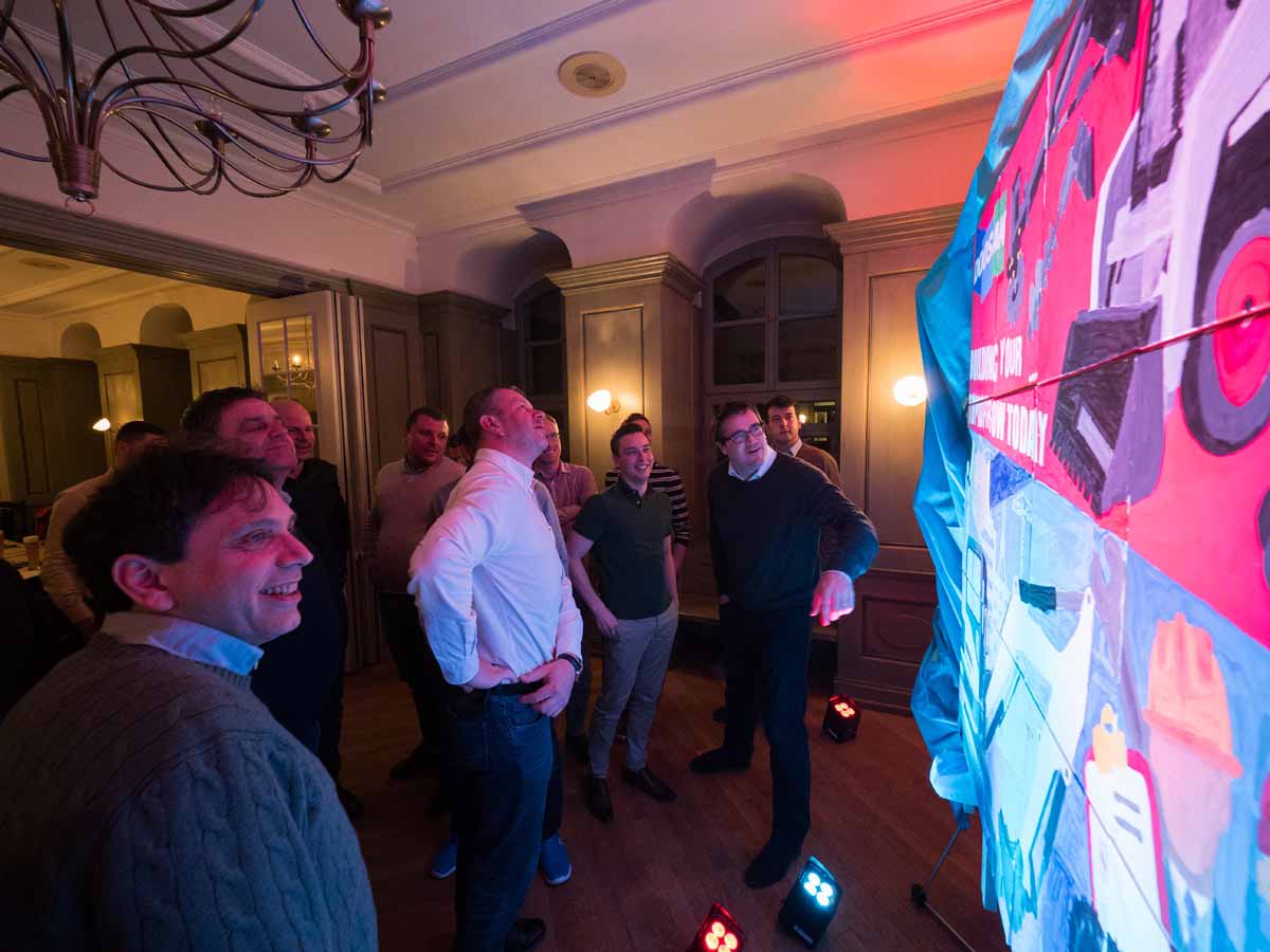 Participants admire their creative and artistic work during a teambuilding in Prague